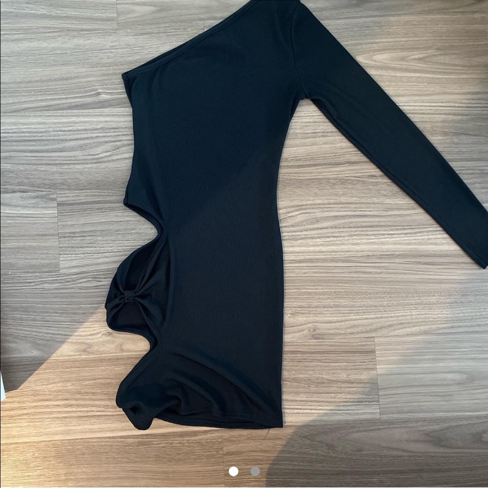 Size small, one sleeve, cutout dress, worn once, no flaws